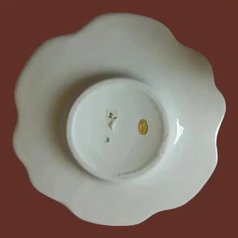 Shabby chic porcelain teacup and saucer